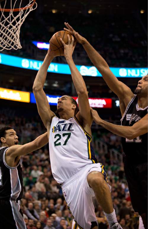 Lennie Mahler  |  The Salt Lake Tribune

Utah Jazz center Rudy Gobert is blocked by Spurs' forward Tim Duncan as Jeff Green, left, looks on in the first half of a game at EnergySolutions Arena in Salt Lake City on Monday, Feb. 23, 2015.
