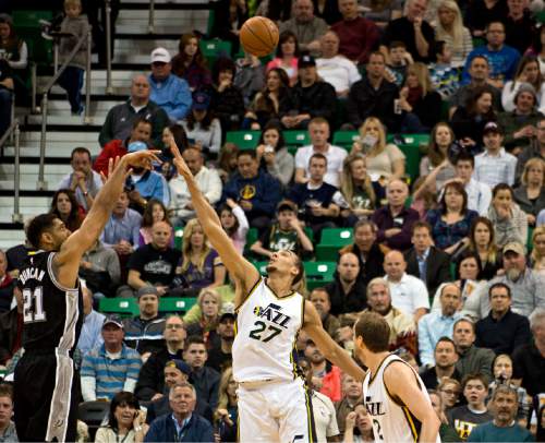 Lennie Mahler  |  The Salt Lake Tribune

San Antonio Spurs forward Tim Duncan shoots over Jazz center Rudy Gobert in the first half of a game at EnergySolutions Arena in Salt Lake City on Monday, Feb. 23, 2015.