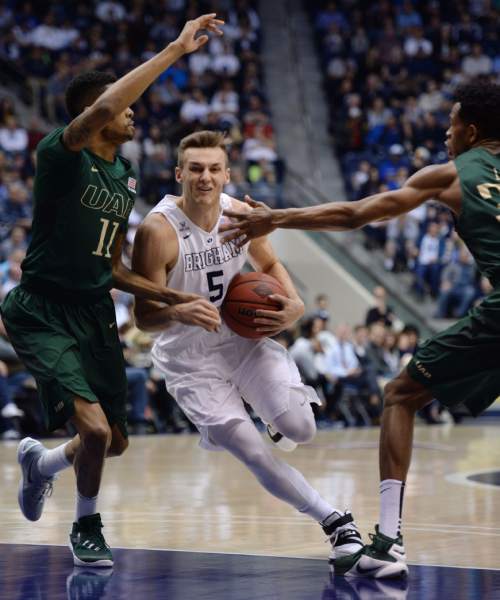 Steve Griffin  |  The Salt Lake Tribune


Brigham Young Cougars guard Kyle Collinsworth (5) drives past UAB Blazers guard Dirk Williams (11) during the first round of the NIT between BYU and UAB at the Marriott Center in Provo, Wednesday, March 16, 2016.