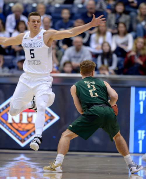 Steve Griffin  |  The Salt Lake Tribune


Brigham Young Cougars guard Kyle Collinsworth (5) jups out to cover UAB Blazers guard Nick Norton (2) during the first round of the NIT between BYU and UAB at the Marriott Center in Provo, Wednesday, March 16, 2016.