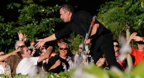 Steve Griffin / The Salt Lake Tribune

OMD frontman Andy McCluskey reaches for fans as OMD and Howard Jones opened for Barenaked Ladies during the "Last Summer on Earth Tour" at Red Butte Garden Amphitheater in Salt Lake City Wednesday July 13, 2016.