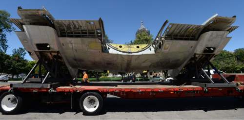 Steve Griffin | The Salt Lake Tribune

The Leonardo moves a piece of a C-131 military transport plane into the Salt Lake City museum Monday, July 11, 2016, as part of its new exhibit "Flight." The installment is part of  the museum's first major exhibit created in-house. The exhibit opens in August.