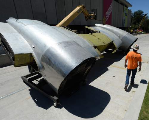 Steve Griffin | The Salt Lake Tribune

The Leonardo moves a piece of a C-131 military transport plane into the Salt Lake City museum Monday, July 11, 2016, as part of its new exhibit "Flight." The installment is part of  the museum's first major exhibit created in-house. The exhibit opens in August.