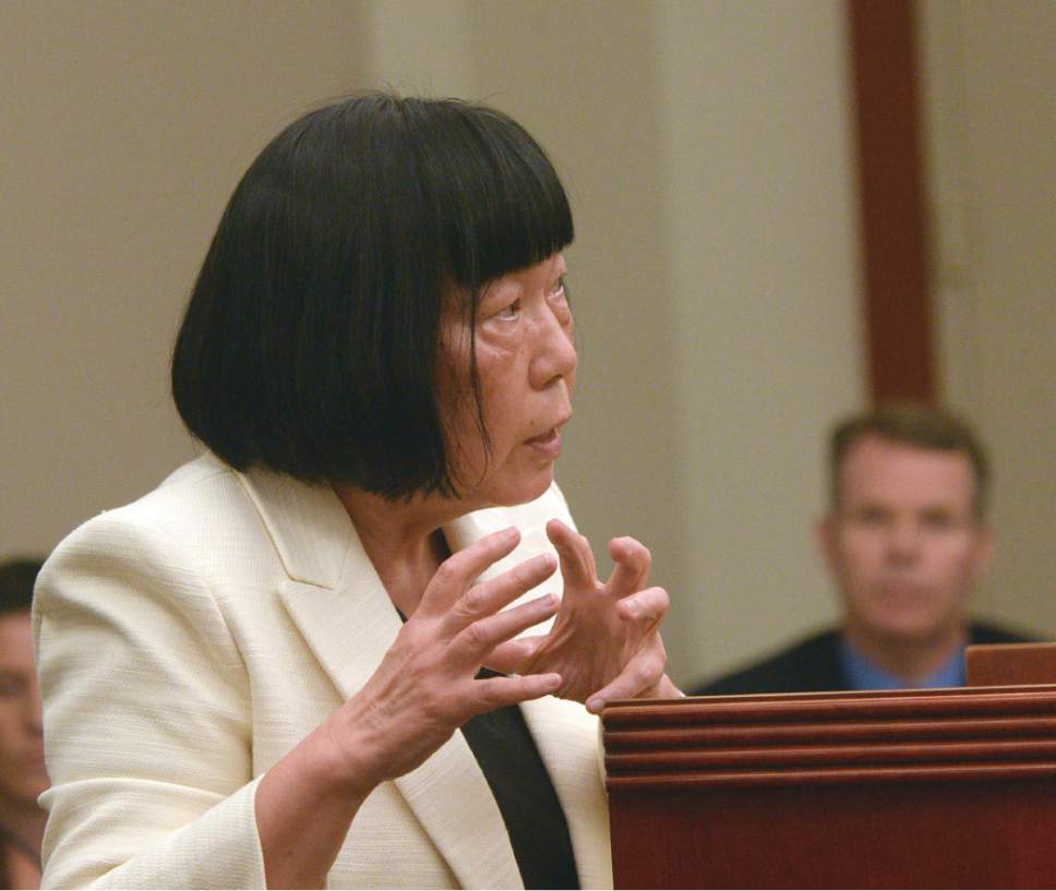 Al Hartmann  |  The Salt Lake Tribune 
Salt Lake County prosecutor Chou Chou Collins addresses the court on Wednesday, July 13, 2016, during a hearing where John Swallow's attorney asked that charges against him be dismissed.
