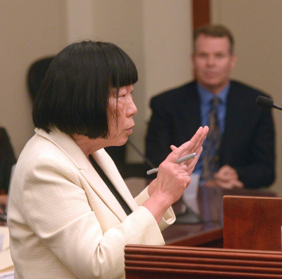 Al Hartmann  |  The Salt Lake Tribune 
Salt Lake County prosecutor Chou Chou Collins addresses the court on Wednesday, July 13, 2016, during a hearing where John Swallow's attorney asked that charges against him be dismissed.