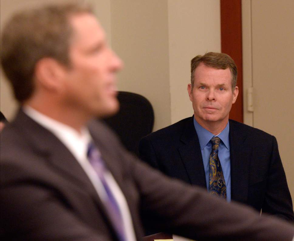 Al Hartmann  |  The Salt Lake Tribune 
Attorney Scott Williams, left, argues that charges against his client, John Swallow, right, should be dismissed during a hearing on Wednesday, July 13, 2016.
