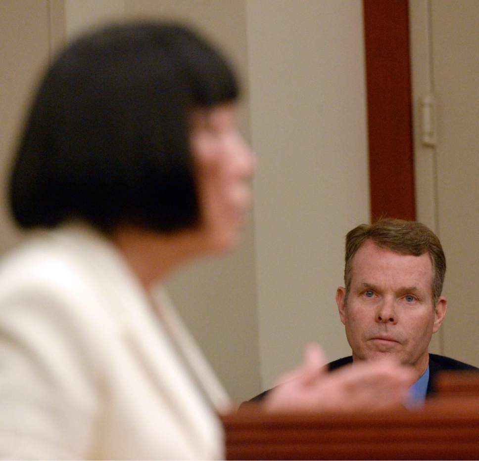 Al Hartmann  |  The Salt Lake Tribune 
John Swallow listens as Salt Lake County prosecutor Chou Chou Collins addresses the court on Wednesday, July 13, 2016, during a hearing where Swallow's attorney asked that charges against him be dismissed.