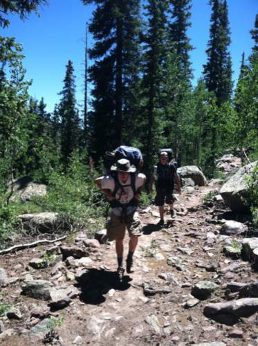 Nate Carlisle  |  The Salt Lake Tribune

Two hikers from the Clinton LDS Second Ward hike the trail to Deer Lake in the Uinta Mountains on July 11, 2016. Deer Lake is a 12-mile roundtrip where hikers gain 2,316 feet.
