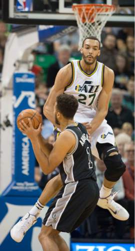 Steve Griffin  |  The Salt Lake Tribune


Utah Jazz center Rudy Gobert (27) crashes into San Antonio Spurs forward Kyle Anderson (1) and is called for a foul during the Jazz versus Spurs NBA basketball game at Vivint Smart Home Arena in Salt Lake City, Tuesday, April 5, 2016.