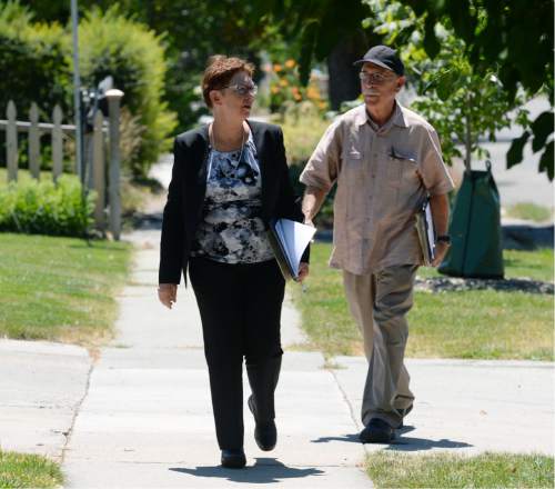 Steve Griffin / The Salt Lake Tribune

Alyson Kennedy, who is running for president on the Socialist Workers Party ticket, walks with campaigner Anthony Dutrow as she campaigns door to door near Liberty Park in Salt Lake City Thursday July 14, 2016.