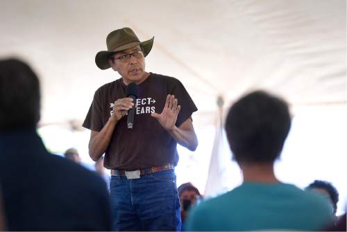 Scott Sommerdorf   |  The Salt Lake Tribune  
Kenneth Maryboy speaks to U.S. Interior Secretary Sally Jewell, right foreground, during a meeting with Jewell another government leaders proceeds in a meadow atop the Bears Ears, Friday, July 15, 2016.