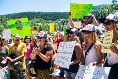 Chris Detrick  |  The Salt Lake Tribune
Protestors rally against Vail Corp outside of Park City Hall Wednesday July 13, 2016. Vail Resorts Inc. has filed for to trademark the name "Park City." Residents and businesses have complained and the municipality has tried to reach an agreement with Vail so that the resort company won't sue the municipality or businesses whose names include the words "Park City." Vail has refused to sign such a contract.