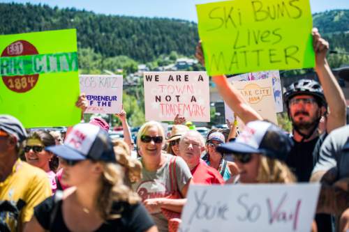Chris Detrick  |  The Salt Lake Tribune
Protestors rally against Vail Corp outside of Park City Hall Wednesday July 13, 2016. Vail Resorts Inc. has filed for to trademark the name "Park City." Residents and businesses have complained and the municipality has tried to reach an agreement with Vail so that the resort company won't sue the municipality or businesses whose names include the words "Park City." Vail has refused to sign such a contract.