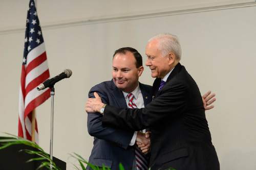 Trent Nelson  |  The Salt Lake Tribune
Senator Mike Lee embraces Orrin Hatch as the Utah Republican delegation meets over breakfast in Akron, OH, Monday July 18, 2016.