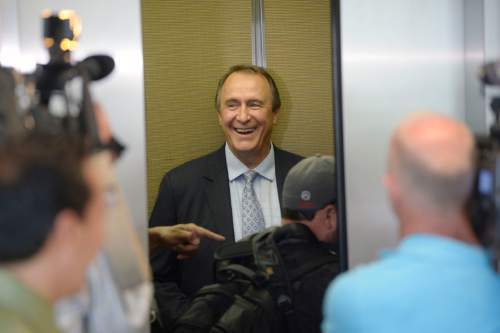 Al Hartmann |  The Salt Lake Tribune
Former Utah Attorney General Mark Shurtleff,  laughs as media photographers climb aboard elevator with him at Matheson Courthouse after his prleiminary hearing in Salt Lake City Monday June 15.