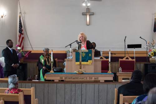 Niki Chan Wylie  |  Special to the Tribune

The Trinity A.M.E. Church Administration and congregation watch as Jackie Biskupski speaks.
