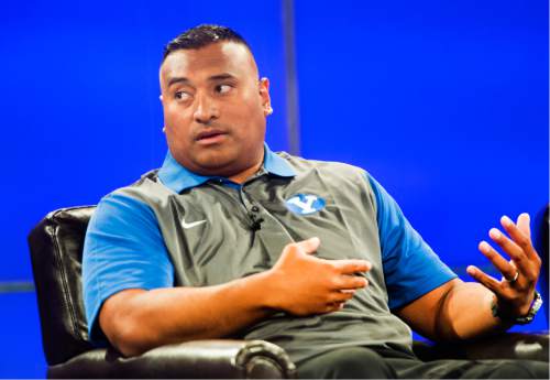 Rick Egan  |  The Salt Lake Tribune

BYU head coach Kalani Sitake answers questions from the press, during the annual football media day at the Broadcasting Building,Thursday, June 30, 2016.