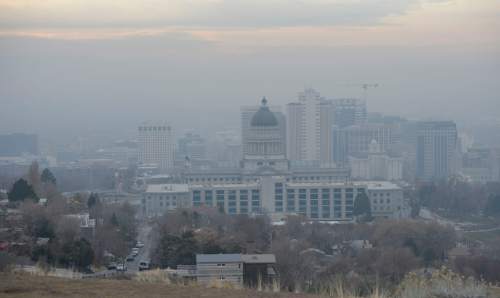 Al Hartmann  |  The Salt Lake Tribune
Hazy scene of downtown Salt Lake City at 9:30 a.m. Friday Dec. 4 a few blocks north of the the Utah State Capitol.  Air quality was in the yellow range.