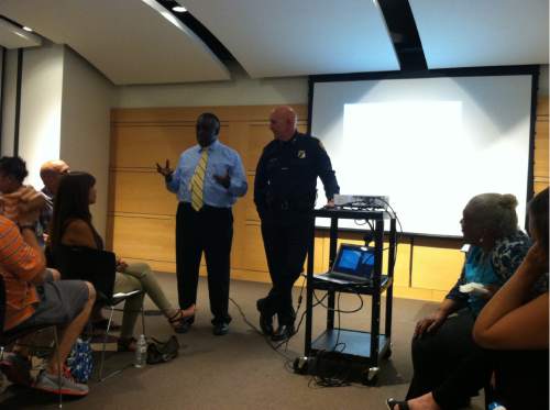 Courtney Tanner  | The Salt Lake Tribune

Salt Lake City Police Chief Mike Brown and community advisory board member David Parker spoke at an event geared toward addressing the concerns parents have for their children of color on July 19, 2016.