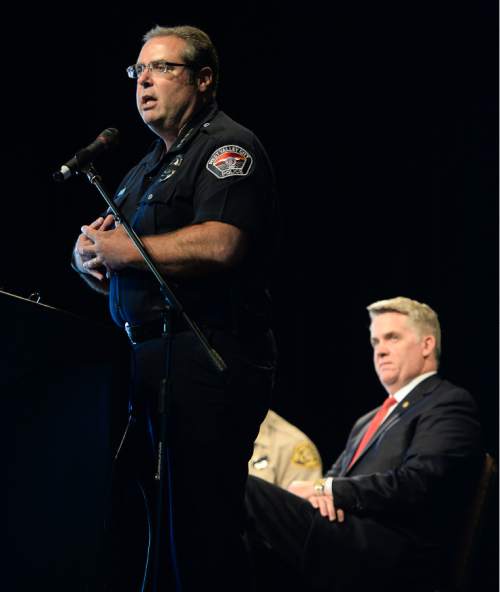 Francisco Kjolseth | The Salt Lake Tribune
West Valley Police Chief Lee Russo addresses Faith group leaders attend a law enforcement symposium, organized by U.S. Attorney for Utah John Huber, at right.