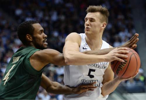 Steve Griffin  |  The Salt Lake Tribune


UAB Blazers guard Robert Brown (4) tries to poke the ball away from Brigham Young Cougars guard Kyle Collinsworth (5) as he tries to defend during the first round of the NIT between BYU and UAB at the Marriott Center in Provo, Wednesday, March 16, 2016.