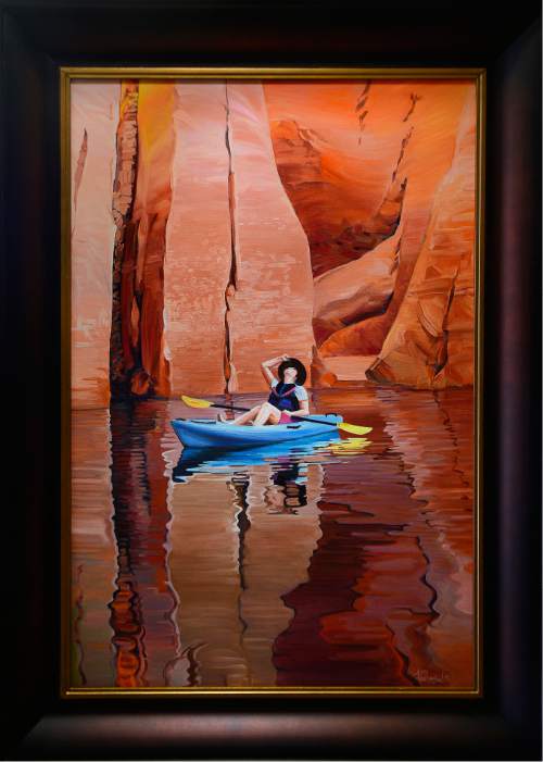 Scott Sommerdorf   |  The Salt Lake Tribune  
"The Wonder of it All" shows the artist Ron Larson's wife, Miken, looking up at the canyon rims while floating in Lake Powell. Artist Ron Larson and his new "Vistas and Visions of the Colorado Plateau" show opening at the George S. & Dolores Dore Eccles Art Gallery at SLCC.