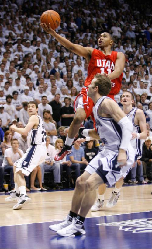 Rick Egan  |  The Salt Lake Tribune

Lawrence Borha soars to the hoop for the Utes, in Mountain West basketball action against BYU at the Marriott Center in Provo, Saturday, February 28, 2009.
