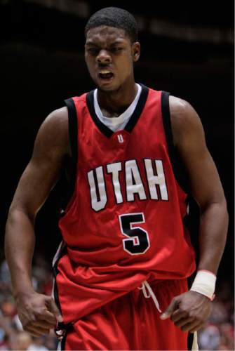 Trent Nelson  |  The Salt Lake Tribune

Utah's Justin Hawkins pumps his fists after being fouled on a dunk. Utah vs. Oklahoma during the NCAA mens basketball tournament, at the University of Arizona on March 19, 2005.