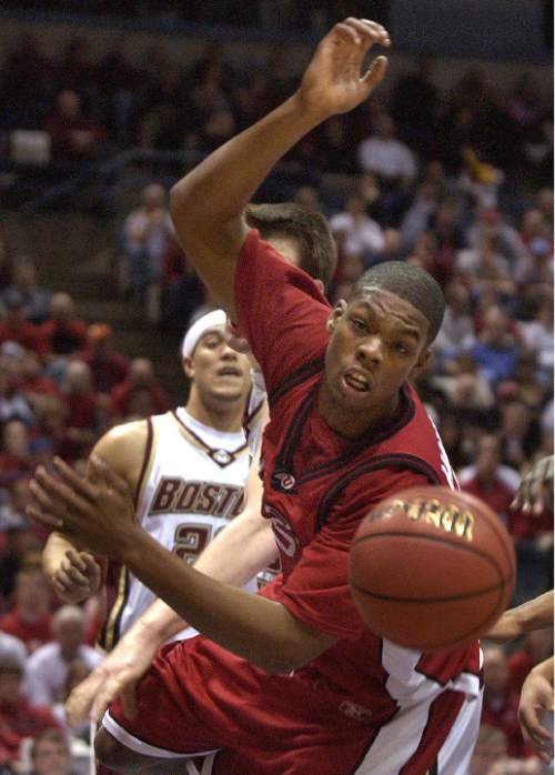 Steve Griffin  |  The Salt Lake Tribune

Utah's Justin Hawkins gets knocked off balance as he tries to rebound the ball during first half action of the Utah, Boston College basketball game during the opening round of the NCAA tournament in Milwaukee WI March 19, 2004.
