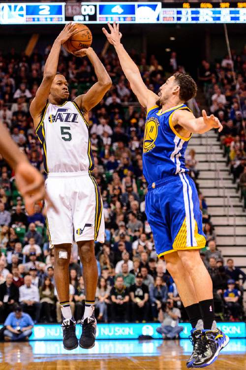 Trent Nelson  |  The Salt Lake Tribune
Utah Jazz guard Rodney Hood (5) shoots a three-pointer as the Utah Jazz host the Golden State Warriors in Salt Lake City, Wednesday March 30, 2016.