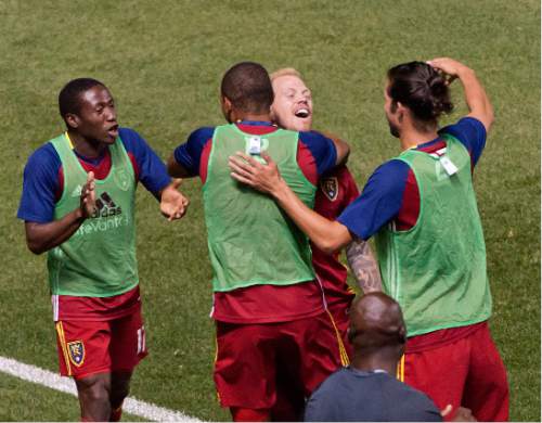 Michael Mangum  |  Special to the Tribune

Real Salt Lake midfielder Luke Mulholland (19) celebrates his game-tying goal with his teammates during their MLS match against the San Jose Earthquakes at Rio Tinto Stadium in Sandy, Utah on Friday, July 22nd, 2016.