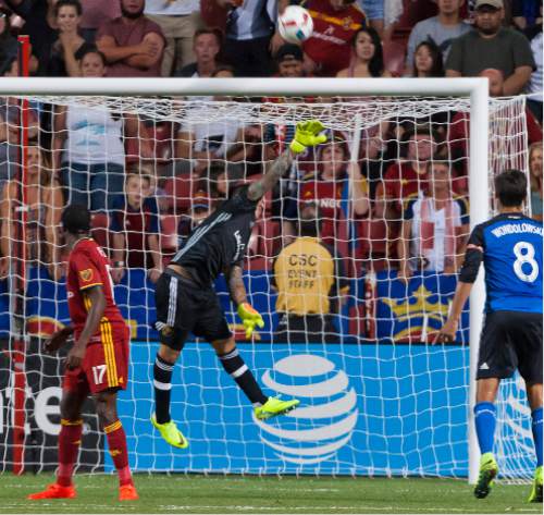 Michael Mangum  |  Special to the Tribune

The ball flies up after hitting the crossbar following a shot from the San Jose Earthquakes as Real Salt Lake goalkeeper Nick Rimando (18) dives to attempt the block during the second half of their MLS match at Rio Tinto Stadium in Sandy, Utah on Friday, July 22nd, 2016. The match ended in a 1-1 draw.