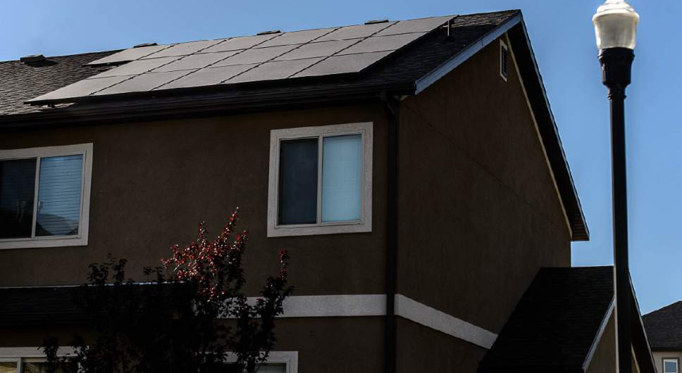 Trent Nelson  |  The Salt Lake Tribune
Solar panels on the roof of a Farmington home, Thursday July 14, 2016. Based on the first quarter, Utah is on track to have more rooftop solar installed in 2016 than in all previous years combined. Adopters say that's because, in the last few months, it's become possible to replace your entire power bill with solar panels--and with state and federal tax credits in place for at least the next year, it's still possible to get the government to refund you almost half the cost.