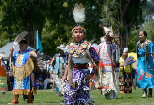 Al Hartmann  |  The Salt Lake Tribune 
Young and old take part in an intertribal social dance at the annual Native American Celebration at Liberty Park July 25.