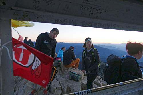 Lennie Mahler  |  The Salt Lake Tribune

Groups of hikers wait for sunrise at the summit of Mount Timpanogos on Sunday, July 24, 2016.