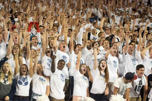Rick Egan  |  The Salt Lake Tribune

Brigham Young fans celebrate as the Cougars take a 11 point lead with seconds left on the clock, after Kai Nacua's touchdown on an interception, in college football action, BYU vs. Boise State at Lavell Edwards Stadium, Saturday, September 12, 2015.