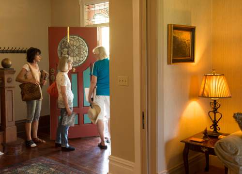 Leah Hogsten  |  The Salt Lake Tribune
Murray Pioneer Home Tour visitors view the Wesley and Frances Walton Home (circa 1899), a brick Victorian Eclectic house, situated on a portion of an original 160 acre homestead owned by the Huffaker pioneer family.