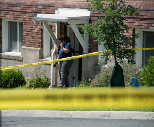 Steve Griffin  |  The Salt Lake Tribune

Police investigate the deaths of two people at apartment complex neart 600 North Center Street in Salt Lake City on Tuesday July 26, 2016.
