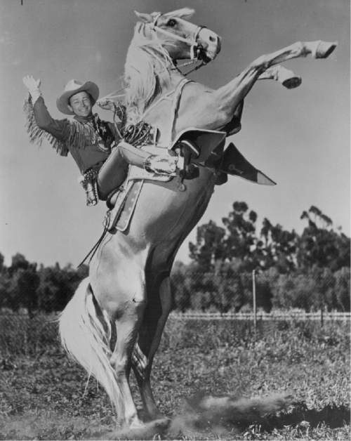 |  Salt Lake Tribune Library

July 18, 1959
Roy Rogers  (& Dale Evans) - Actor
Cowboy Roy Rogers  is jumping along with the horse while riding with smile.