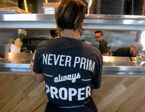 Al Hartmann  |  The Salt Lake Tribune 
You can't get Proper beers any fresher than here at Proper Burger and Proper Brewing's new location on Main Street in downtown Salt Lake City. Wash down burgers and killer fries with your brews on the patio or over a game of pool.