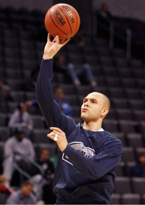 |  Tribune File Photo

BYU's Jonathan Tavernari (45) takes a shot during a practice session Wednesday, March 17 2010 at the Ford Center in Oklahoma City. The University of Florida and Brigham Young University will face each other Thursday in the first round of the NCAA basketball tournament.