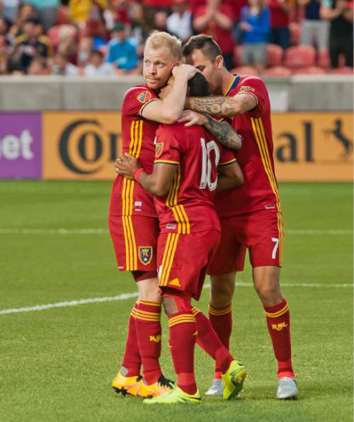Michael Mangum  |  Special to the Tribune

Real Salt Lake players, Luke Mulholland, left, Joao Plata (10) and Burrito Martinez celebrate Plata's successful penalty kick during their U.S. Open Cup match against the Seattle Sounders at Rio Tinto Stadium in Sandy, UT on Tuesday, June 28th, 2016.
