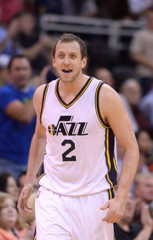 Steve Griffin  |  The Salt Lake Tribune

Utah Jazz forward Joe Ingles (2) smiles after he nailed his second three-pointer of the fourth quarter during Utah Jazz versus New York Knicks NBA basketball game at EnergySolutions Arena in Salt Lake City, Tuesday, March 10, 2015.