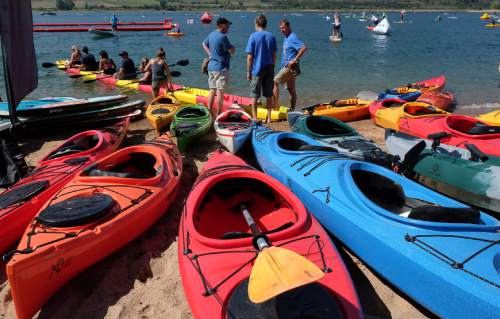 Francisco Kjolseth | The Salt Lake Tribune
A snap together kayak makes for a long ride by Point 65˚N kayaks from Sweden at the Outdoor Retailer Summer Market kicks off with demo day at Pineview Reservoir's Cemetery Point in Huntsville on Tuesday, Aug. 4, 2015. Many of the manufacturers who will be at Summer Market use the opportunity to let retailers try their products, from paddle boards, canoes, kayaks and other water recreation gear.