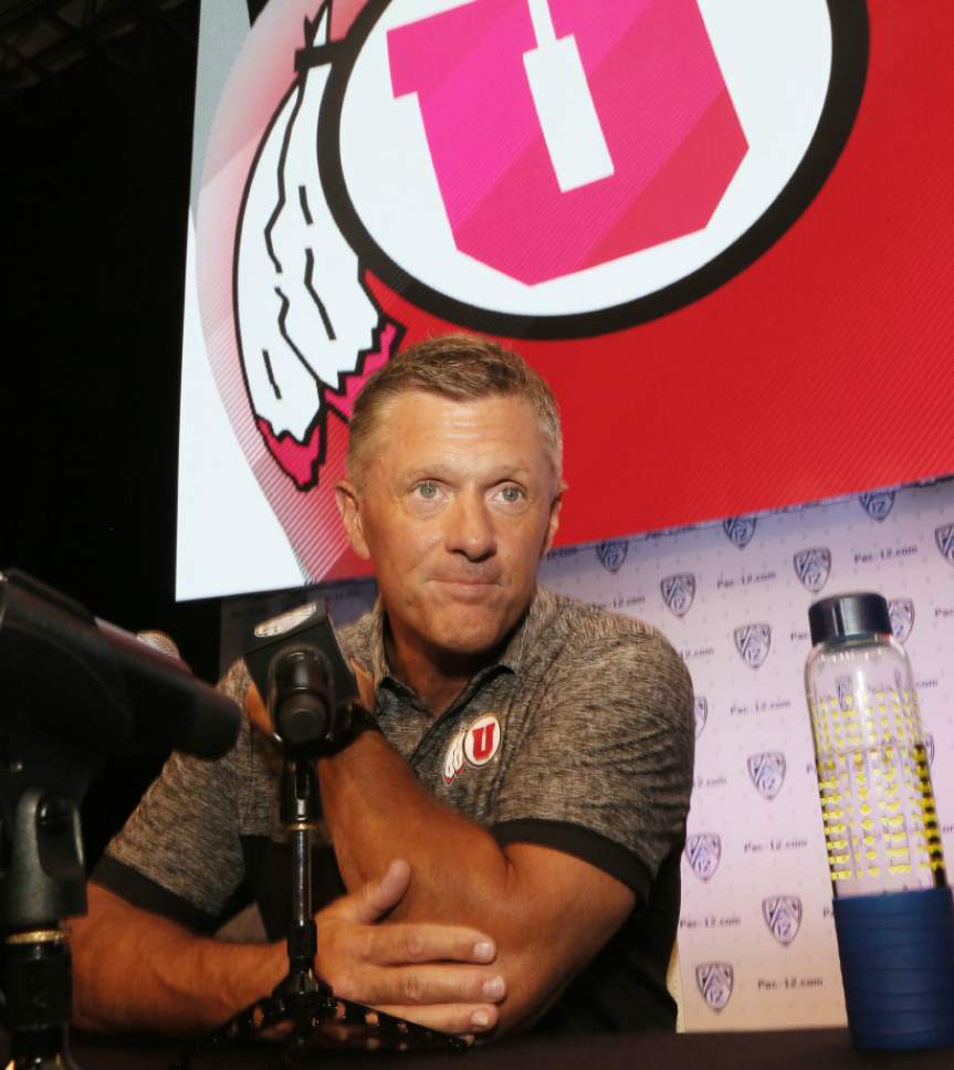 Utah coach Kyle Whittingham speaks at the Pac-12 NCAA college football media day in Los Angeles on Thursday, July 14, 2016. (AP Photo/Reed Saxon)