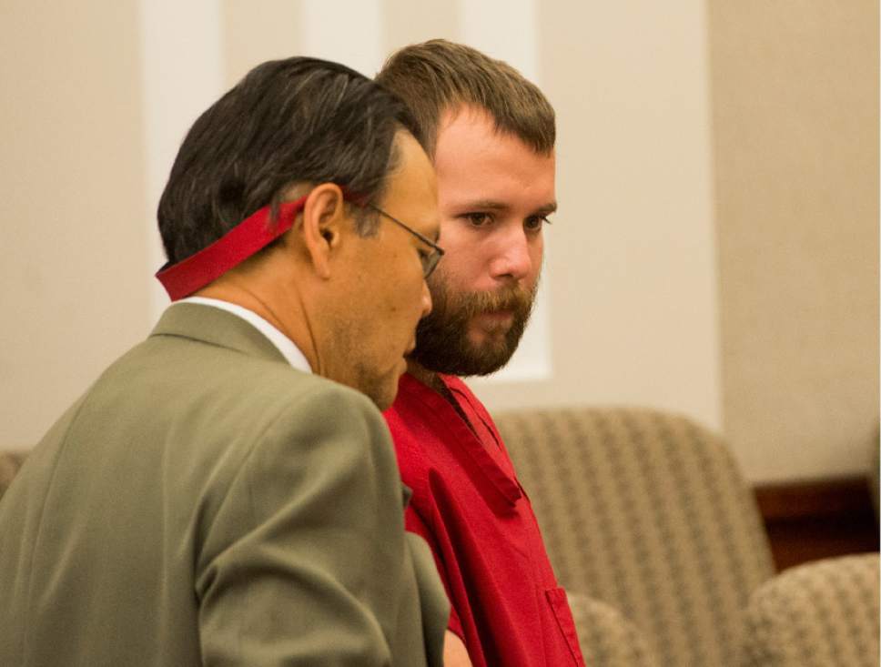 Rick Egan  |  The Salt Lake Tribune

Dereck James Harrison stands with public defender Ron Fujino, as he makes his initial court appearance for kidnapping charges at the Farmington Courthouse, Monday, May 23, 2016.

Harrison's father, Flint, was found dead in his jail cell July 25, 2016, having apparently hung himself.