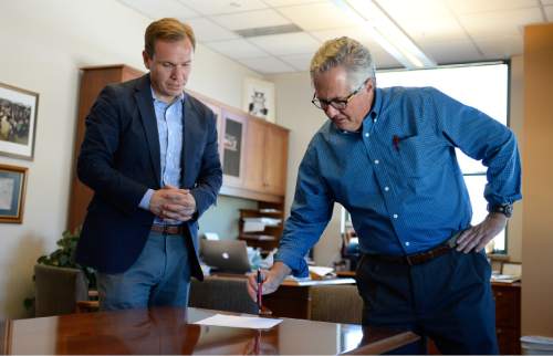 Francisco Kjolseth | Tribune file photo
The Salt Lake Tribune's new owner, Paul Huntsman, visits the offices to wrap up the final details Tuesday, May 31, 2016, as he speaks with then-Editor Terry Orme. Huntsman recently replaced Orme with former reporter Jennifer Napier-Pearce.