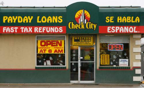 Leah Hogsten  |  Tribune file photo
Lawmakers in recent years have tightened rules on payday lenders but the state still has relatively loose restrictions and state regulators are lax at enforcing the ones on the books.