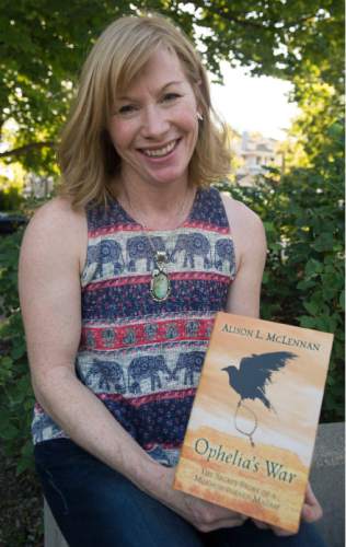 Steve Griffin / The Salt Lake Tribune

Utah writer Alison McLennan with her novel, "Ophelia's War, in Salt Lake City Wednesday July 20, 2016.