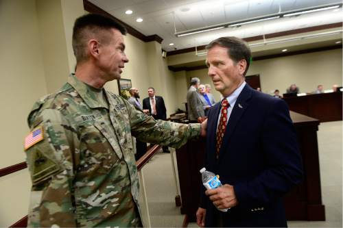 Scott Sommerdorf   |  The Salt Lake Tribune  
Utah Congressman Chris Stewart, right, greets Major General Jefferson S. Burton, Adjutant General - Army for the Utah National Guard on Wednesday prior to speaking to the Legislature's Veterans' and Military Affairs Commission about his ideas for reforming the VA.